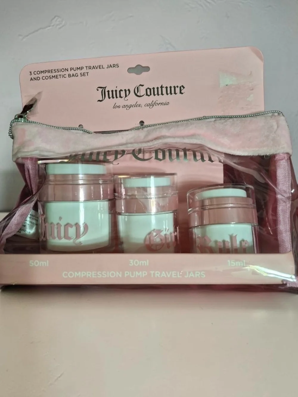 Juicy Couture Pink Travel Compression Pump Jar Set with Cosmetic Bag